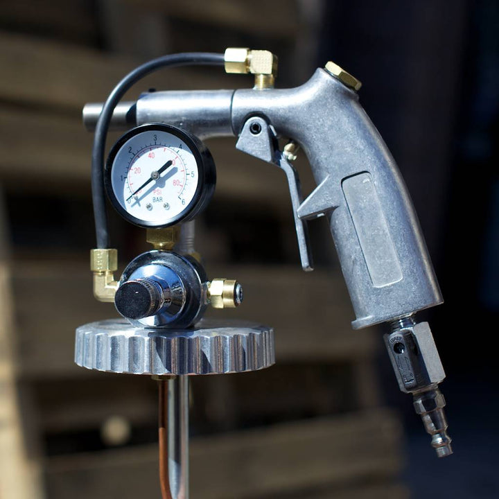 Blaster Dust Gun head featuring a pressure valve and flow control.