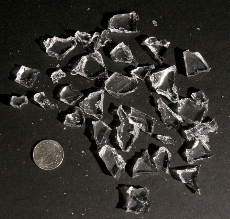 Rubber shattered glass with coin for size comparison